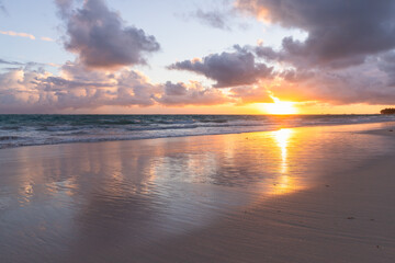 Fototapeta na wymiar Sunrise over Atlantic ocean coast. Dominican republic, Bavaro beach