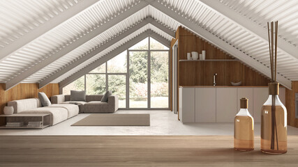 Wooden table top or shelf with aromatic sticks bottles over minimal mansard mezzanine living room and kitchen, modern architecture interior design