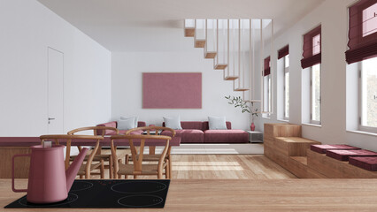 Wooden kitchen work top with induction hob and teapot close up. Nordic living and dining room in white and red tones. Sofa and staircase. Minimal interior design