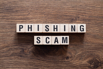 Phishing scam - word concept on building blocks, text
