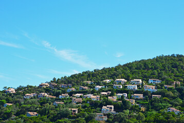 Fototapeta na wymiar Many modern villas on one of the hills in Les Issambres