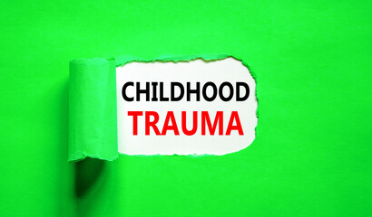 Childhood trauma symbol. Concept words Childhood trauma on beautiful white paper. Beautiful green paper background. Business psychology childhood trauma concept. Copy space.