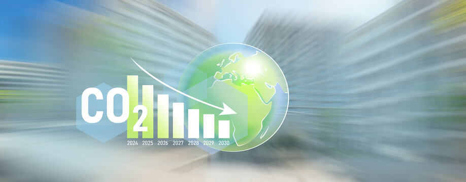 Vector decreasing diagram, planet Earth drawing. The concept of reduce co2 emission, motion blur of cityscape on the background.