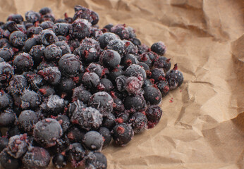frozen blackcurrant on craft paper