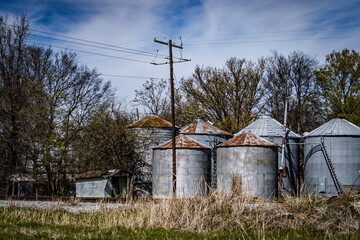 Fototapeta na wymiar Old silos or grain bins used for storing crops.