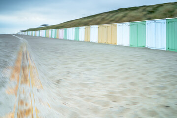 Beach cabins colorfully colored tiny houses
