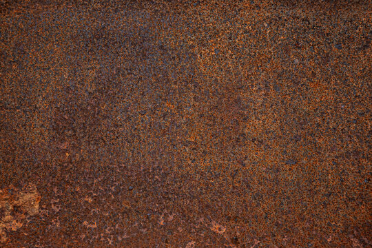 Close-up of an old, weathered and rusty metal surface. High quality and resolution full frame textured grunge rust background.