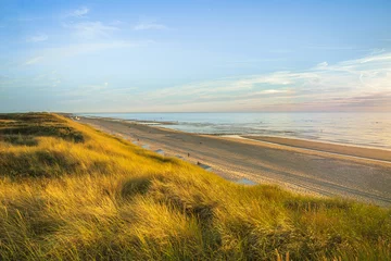 Gordijnen Mesmerizing seascape during sunset in Zeeland, The Netherlands © fotografiecor