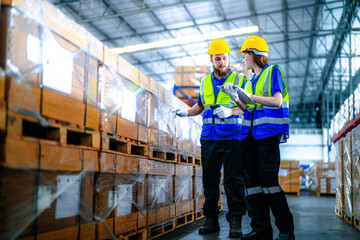 workers using Laser Barcode Scanner to checking stock items for shipping. male and female inspecting the store factory. industry factory warehouse. Logistics employees working at warehouse management.