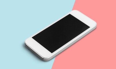 Modern smartphone with a blank screen on color background