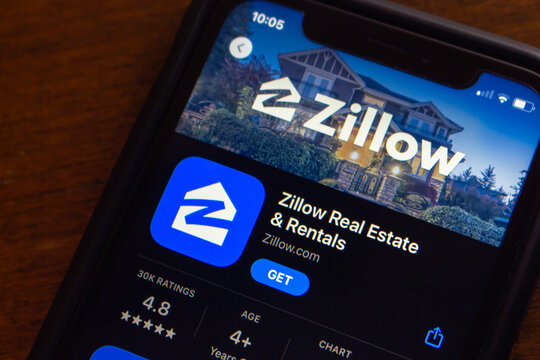 Vancouver, CANADA - Aug 16 2023 : Closeup of Zillow app seen in App Store on iPhone screen. Zillow Group, Inc. is an US tech real-estate marketplace company