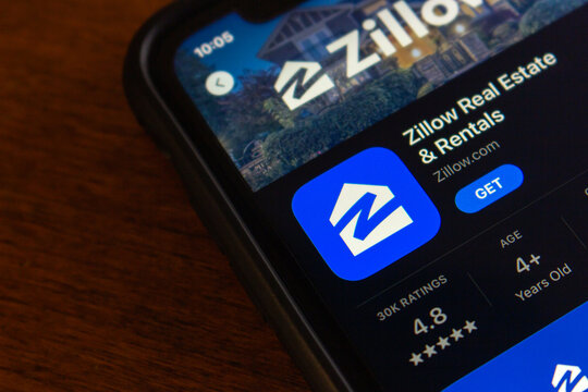 Vancouver, CANADA - Aug 16 2023 : Closeup of Zillow app seen in App Store on iPhone screen. Zillow Group, Inc. is an US tech real-estate marketplace company