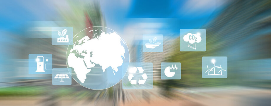 Renewable, sustainable development conceptual icons with motion blur of business city on background.