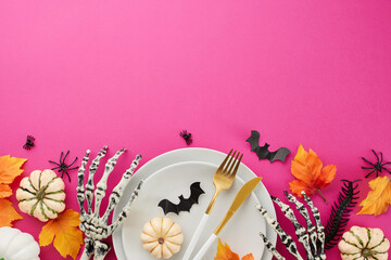 Curating an enchanting Halloween table setting. Top view composition of plates, cutlery, pumpkins,...