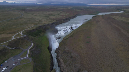 AERIAL VIEW - Gullfoss ("Golden Falls") is a waterfall located in the canyon of the Hvítá River in southwest Iceland. The rock of the river bed was formed during an interglacial period.