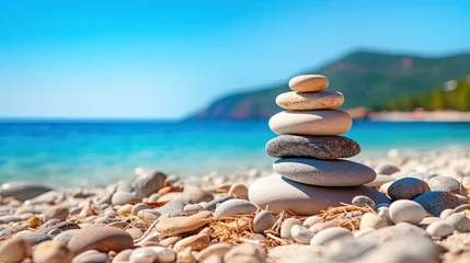Fotobehang A stack of stones on the ocean at sunset. Pyramid of pebbles on the beach. The concept of balance, harmony, meditation, rest or seaside vacation. Illustration for cover, card, interior design or print © Login