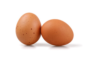Two chicken eggs isolated on white background