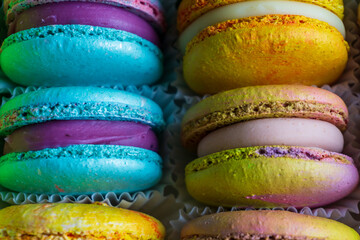 Colorful french macarons, close up.Different colorful macaroons background. 