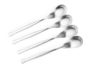 Metal spoons isolated on white background