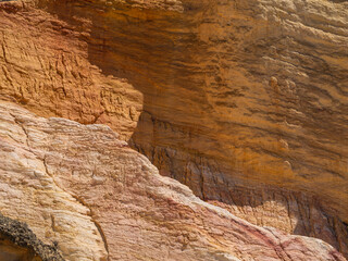 Abstract Rustrel canyon ocher cliffs landscape. Provencal Colorado near Roussillon, Southern France.