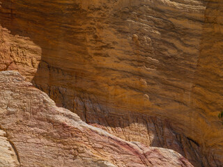 Abstract Rustrel canyon ocher cliffs landscape. Provencal Colorado near Roussillon, Southern France.