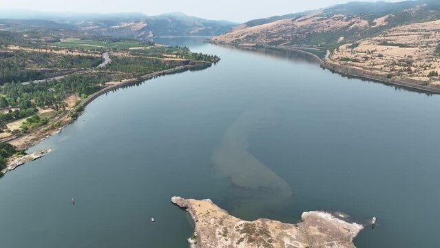 The Columbia River Gorge is a federally protected scenic area forming the boundary between Washington and Oregon. The scenic area is a popular area for hiking, biking, fishing, and water sports.