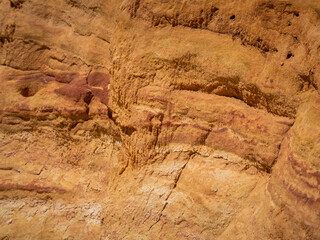 Abstract Rustrel canyon ocher cliffs landscape. Provencal Colorado near Roussillon, Southern France.
