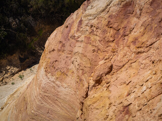 Abstract Rustrel canyon ocher cliffs landscape. Provencal Colorado near Roussillon, Southern France.