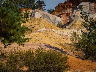Fototapeta na wymiar Colorful rock formations from ocher in the Colorado Provencal, Provence, France