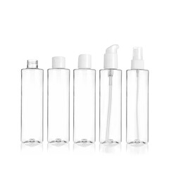 Group of PET cosmetic transparent bottles isolated on white background with disc top cap, flip cap,...