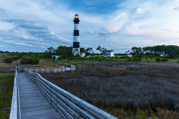 Bodie Island Lighthouse at dawn on the Outer Banks in North Carolina, USA - 640384410