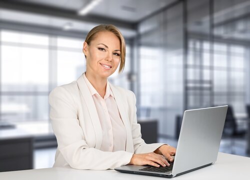 Young busy business woman working on laptop, AI generated image