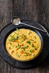 Beer cheese soup with vegetables and thyme