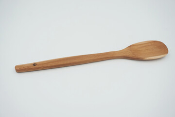 plain white background wooden spatula