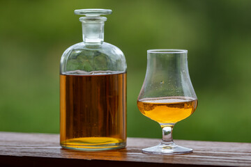 Single malt scotch whisky in selective focus and minimalistic photo. Space for text