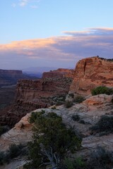 blue sky and purple clouds over canyonlands national park