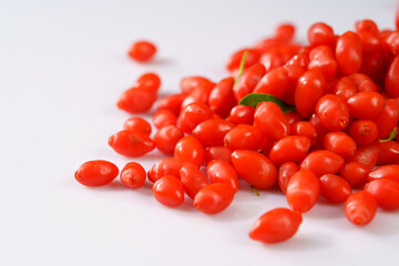 Fresh goji berries on a white background