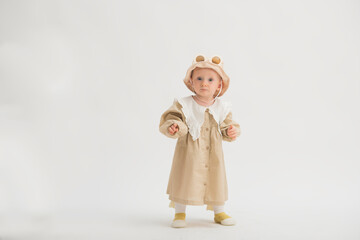 cute baby on a white background for advertising.adorable baby girl 1 year old on a white background looking at the camera