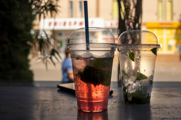 Strawberry mojito at the bar. Blurred background.