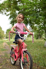 little girl riding a bike