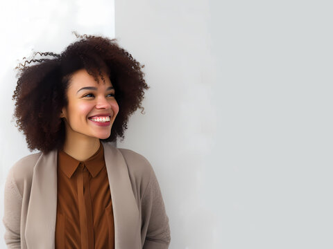 portrait of a happy woman on a gray background