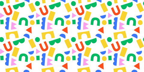 Fun colorful geometric shape seamless pattern. Creative abstract children style art background for kid education or trendy design with playful geometry shapes. Simple childish wallpaper texture.