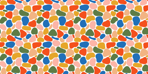 Abstract flat organic shapes seamless pattern. Trendy colorful freehand shape background design. Scribble decoration wallpaper, artistic terrazzo style stones or childish blobs.