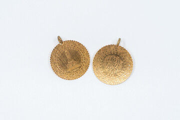 Shot of Turkish half gold isolated on a white background.