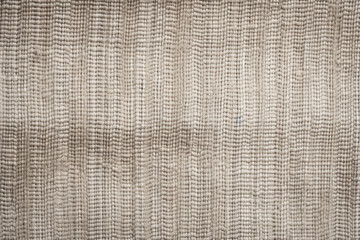 Fototapeta premium Captivating Close-Up: A Macro Shot Revealing the Intricate Details of Ribbed Linen Fabric