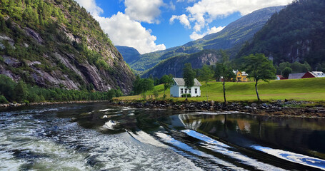 Fjord Cruise Bergen, Mostraumen, Norway. View of the fjord, island with houses from the boat....