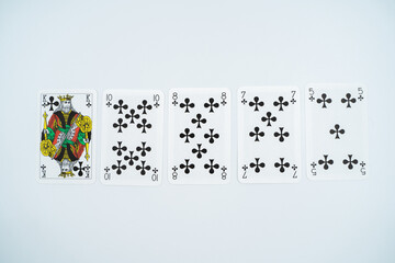Flush playing cards isolated on white background.