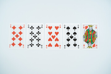 Four of a kind playing cards isolated on white background.