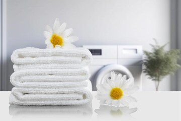 Obraz na płótnie Canvas fresh clean soft towels on desk in bathroom.