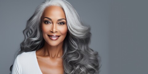 Older black woman with gray hair beauty photoshoot with copy space